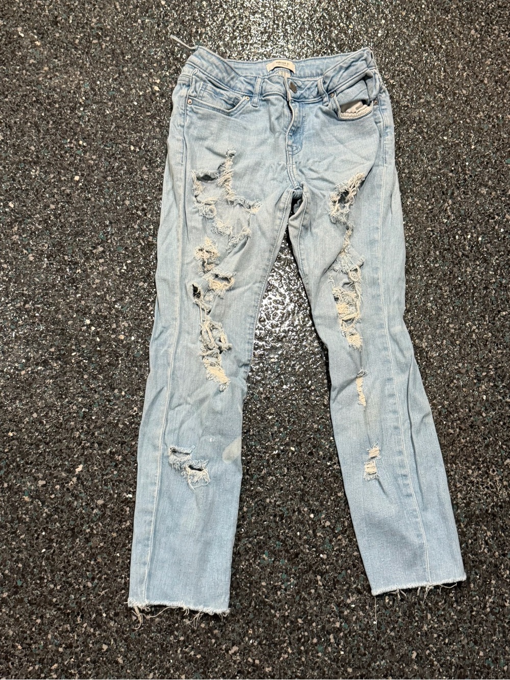 Forever 21 light-wash distressed ripped frayed bottom size 27 women’s jeans